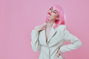 Beauty Fashion woman in a suit makeup pink hair posing color background unaltered photo