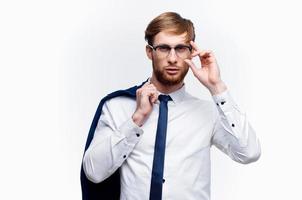 a man in a shirt with a jacket in his hands manager finance office photo