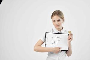 Businesswoman in a white shirt with a folder in hand isolated background photo
