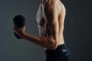 sporty man with dumbbells workout exercise fitness photo