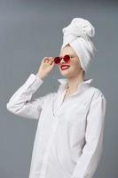 fashionable woman with a towel on his head in a white shirt Lifestyle posing photo