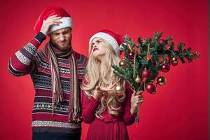 man and woman holiday christmas emotions romance decoration photo