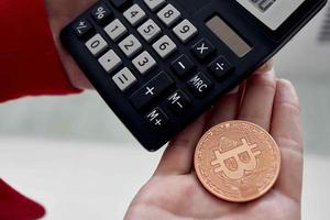 cryptocurrency Bitcoin calculator calculating the cost of internet finance photo