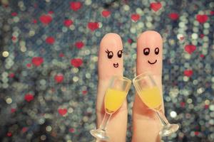 Finger art of a Happy couple. Couple making good cheer. photo