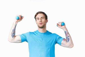 sports man in t-shirt workout fitness gym photo