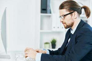 business man wearing glasses work desk office manager photo