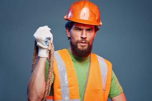 bearded man in orange hard hat construction professional cropped view photo