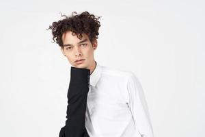 parkneft handsome man in shirt and jacket on light background curly hair suit model photo