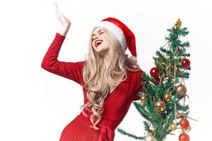 woman dressed as santa claus christmas tree holiday christmas photo