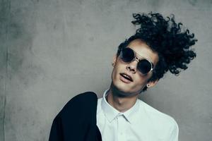 guy with curly hair teen classic suit sunglasses shirt photo