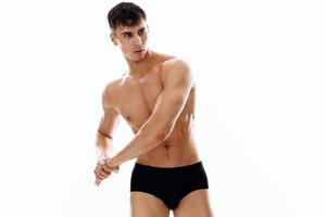 masculino atleta con desnudo muscular cuerpo rutina de ejercicio motivación foto