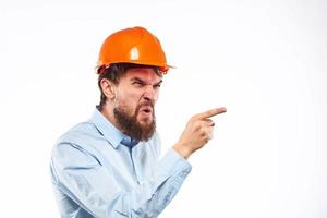 Business man in orange helmet shirt construction security professionals photo