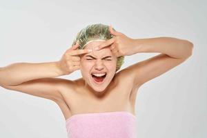 woman with bare shoulders shower cap hygiene clean skin face photo