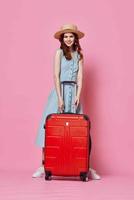 woman with red suitcase vacation instead of travel appointment isolated background photo