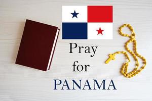 Pray for Panama. Rosary and Holy Bible background. photo