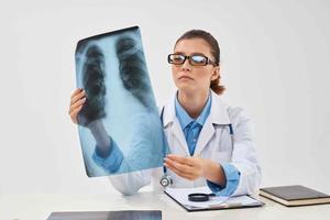 woman doctor radiologist x-ray diagnostics lung treatment photo