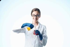 Cheerful woman laboratory assistant chemical solution biology research photo