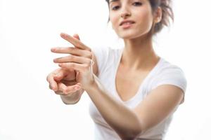 woman with lotion in hands skin care cosmetology moisturizing photo