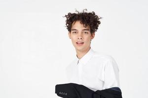 parkneft handsome man in shirt and jacket on light background curly hair suit model photo