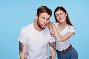 young couple white t-shirts fun tattoos for men photo