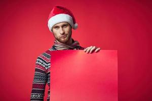 emotional man in a christmas red mockup poster isolated background photo
