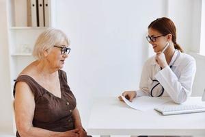 elderly woman patient hospital examination health complaint photo