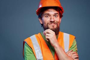 Bearded man in work uniform construction professional cropped view photo