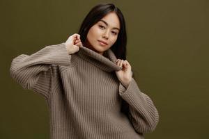young woman in a sweater posing smile clothing fashion Lifestyle photo