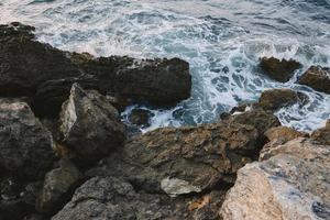 Rocky stones by the ocean nature landscape summer photo