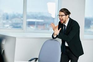 man in a suit documents in hand communication by phone technologies photo