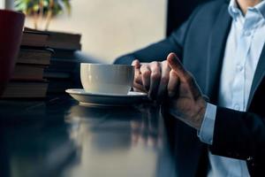 business man in a suit sitting in a cafe leisure manager finance photo