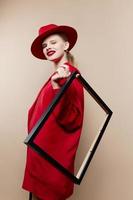 woman red lips fashion jacket frame beige background photo