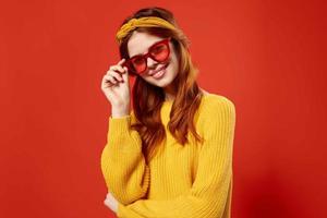 cheerful woman with yellow headband red glasses fashion hipster retro photo