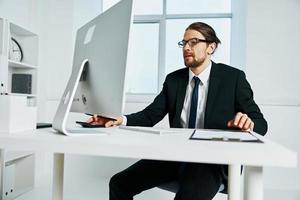 man in a suit documents in hand communication by phone Lifestyle photo