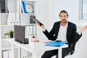 Man work emotions in front of laptop communication boss photo