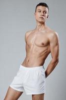 attractive bodybuilder muscular torso fitness model Copy Space photo