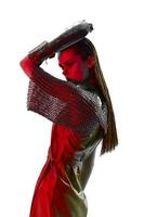 photo pretty woman red light silver armor chain mail fashion blue background