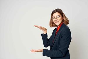 woman in suit document work professional light background photo