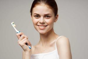 woman in white t-shirt dental hygiene health care studio lifestyle photo