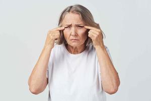 elderly woman poor eyesight ophthalmologist treatment photo