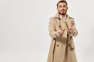 man in coat fashion glamor attractive look modern style photo