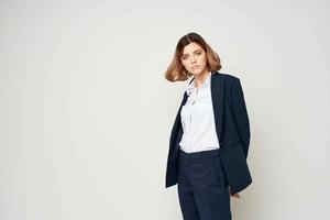 cheerful pretty woman in a suit work documents manager photo