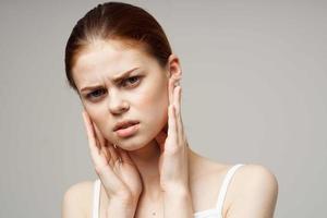 sick woman ear pain otitis media health problems infection studio treatment photo