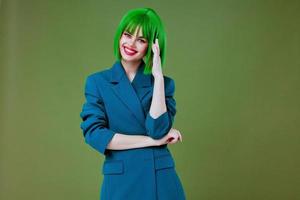 Young woman Glamor green wig red lips blue jacket studio model unaltered photo