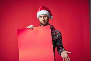 emotional man in a christmas red mockup poster isolated background photo