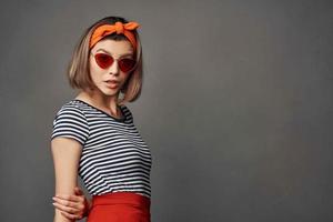 woman wearing sunglasses fashion posing orange headband luxury photo