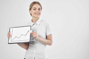 financier in a white shirt with a folder in hand isolated background photo