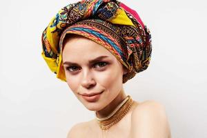 cheerful woman decoration multicolored turban ethnicity fashion studio photo