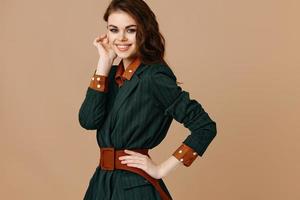 woman in fashionable coat with red belt and fashionable shirt model photo