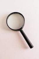 Isolated magnifying glass photo